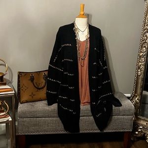 This sweater cardigan is like heaven to wear and fits like a  glove